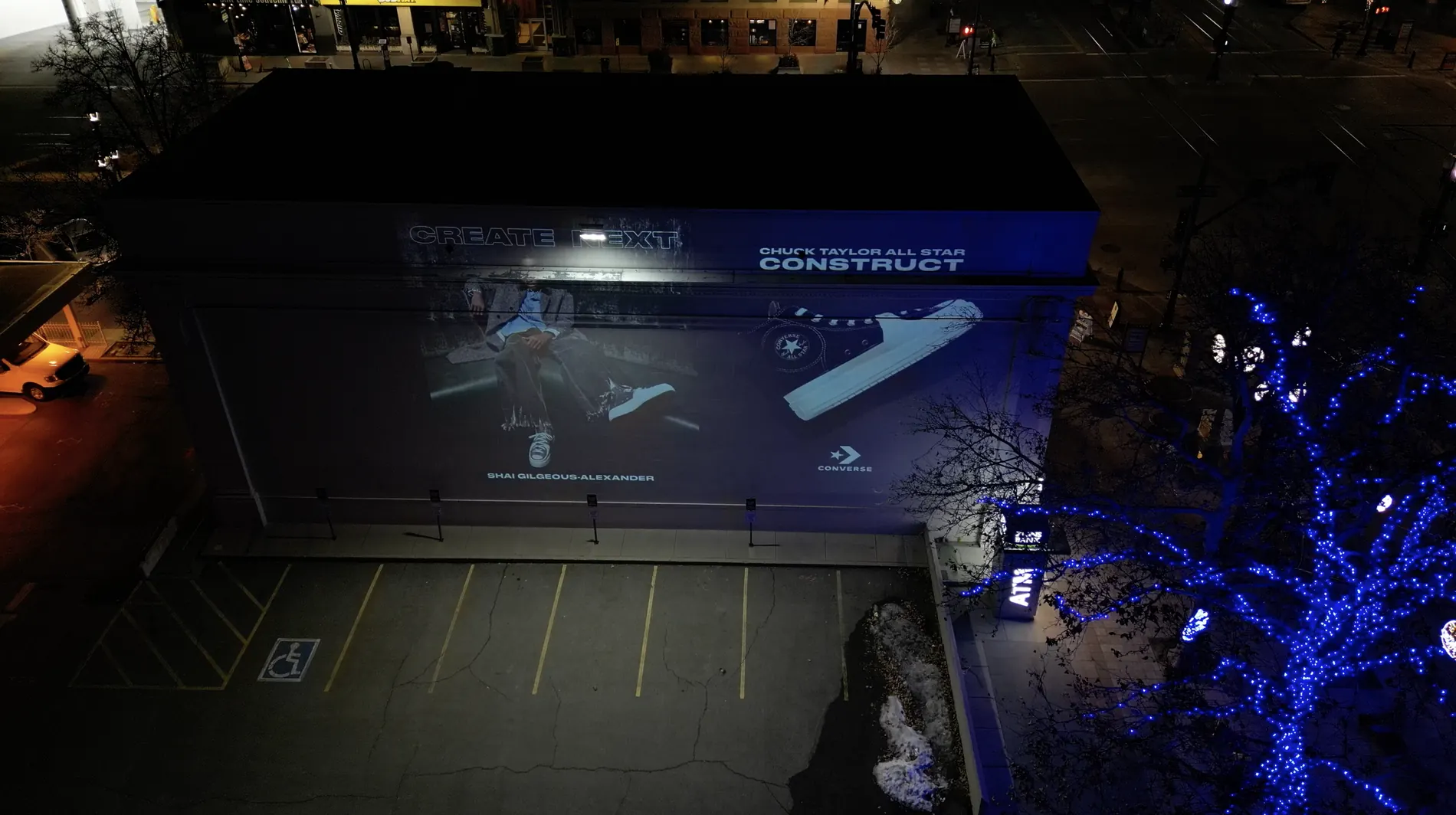 Large projection campaign across a city building facade