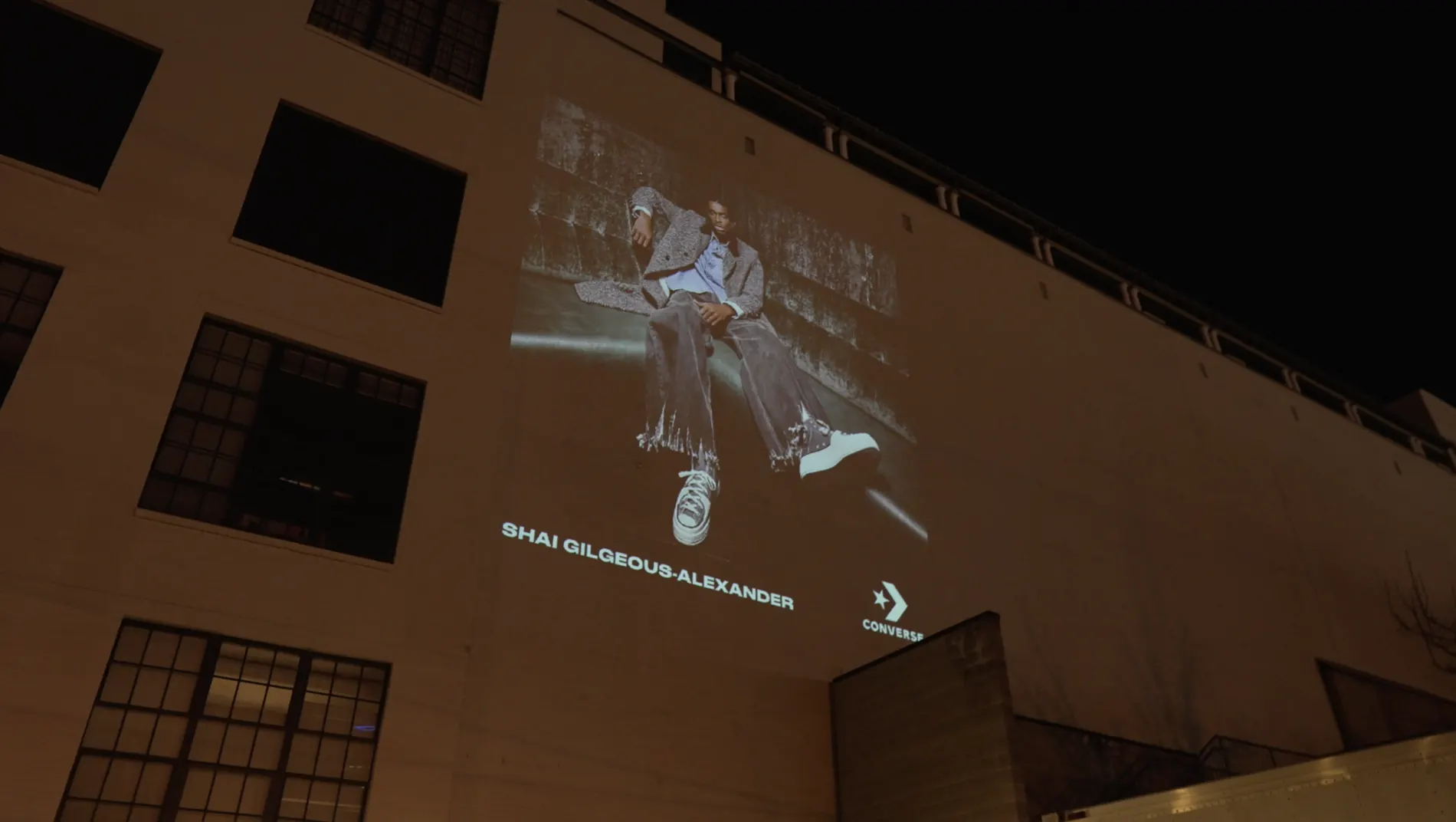 Large projection advertising campaign on an exterior wall